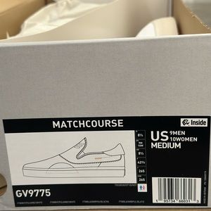 Adidas White slip on Golf Shoes. Unisex. Ladies size 10, Men’s size 9. New.